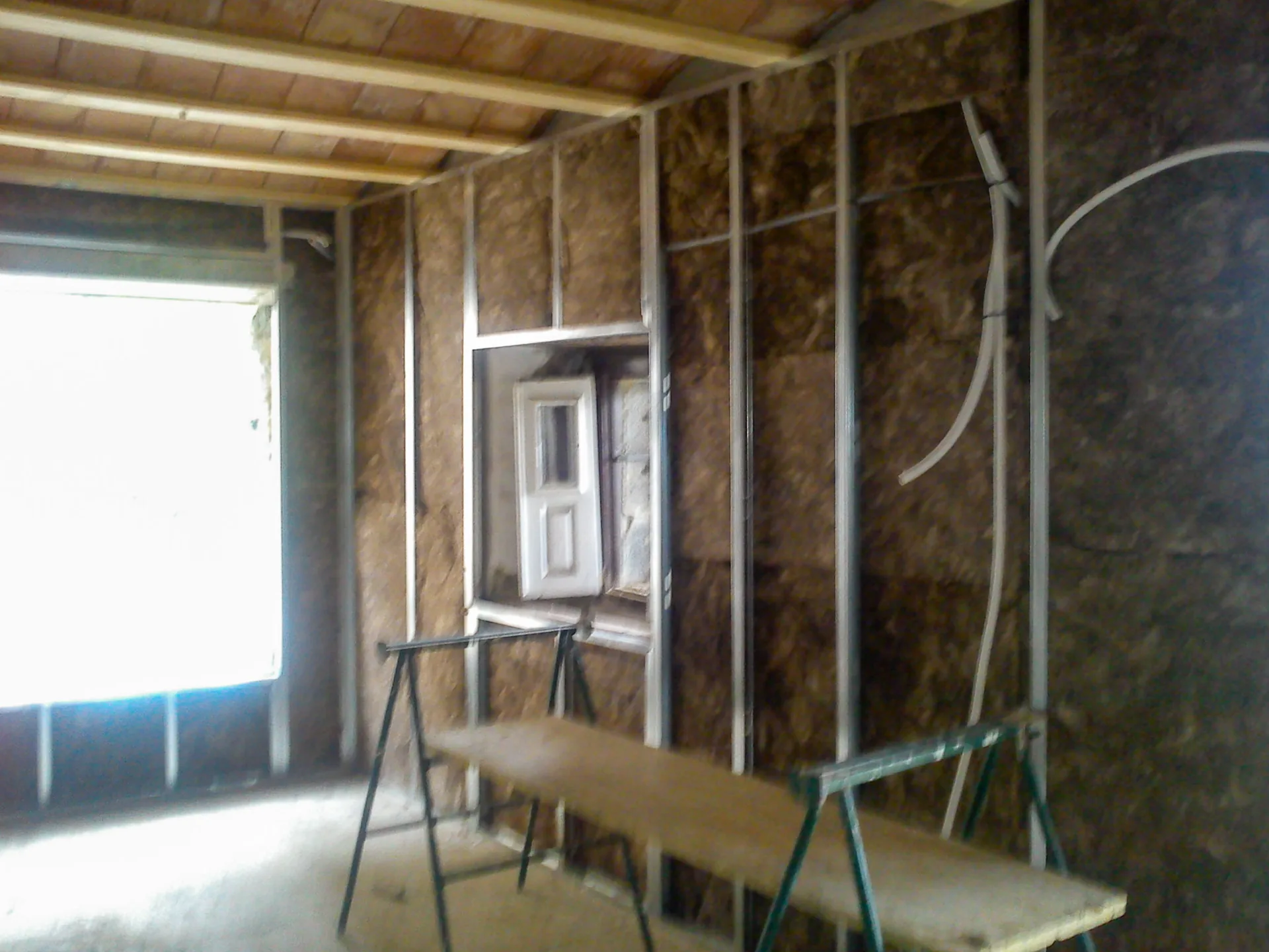 Adding thermal insulation to interior walls