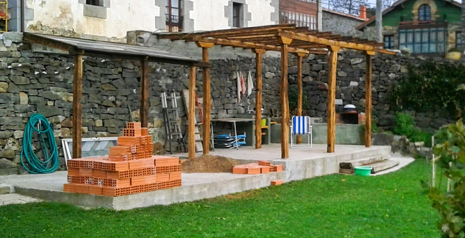 Completed garden pergola terrace with vine covering