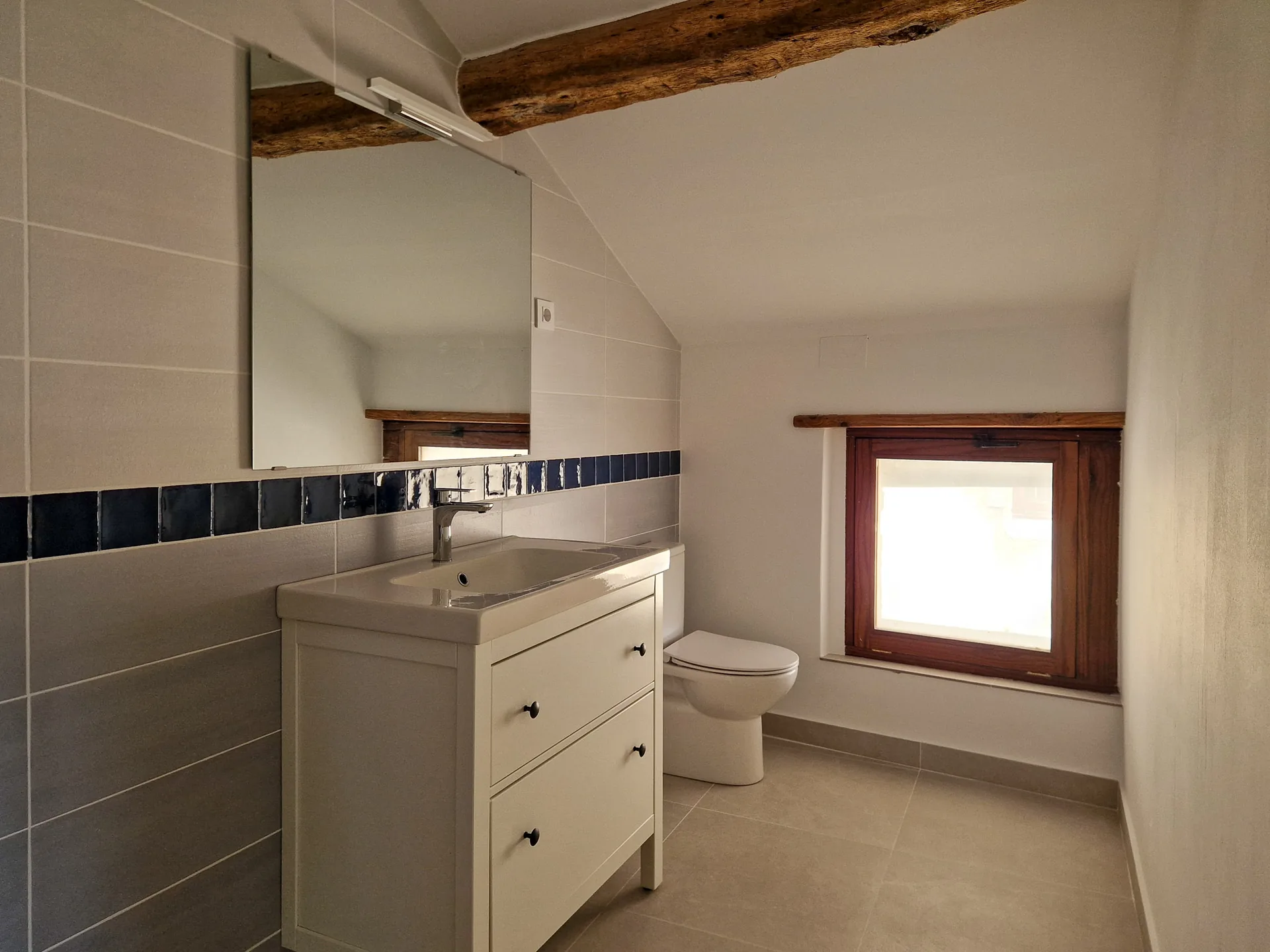 Blue bathroom after